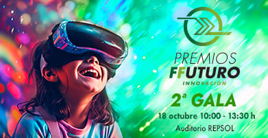Niña sonriente usando un casco de realidad virtual con efectos de luces coloridas a su alrededor, reflejando emoción e ilusión al mirar hacia el futuro y los avances tecnológicos que nos esperan. Imagen representativa de la segunda Gala de los Premios FFuturo Innovación 18 de octubre 10:00 - 13:30 en el Auditorio REPSOL.